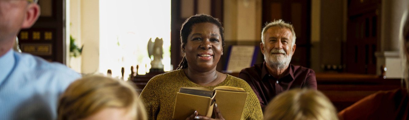 Lady in church congregation