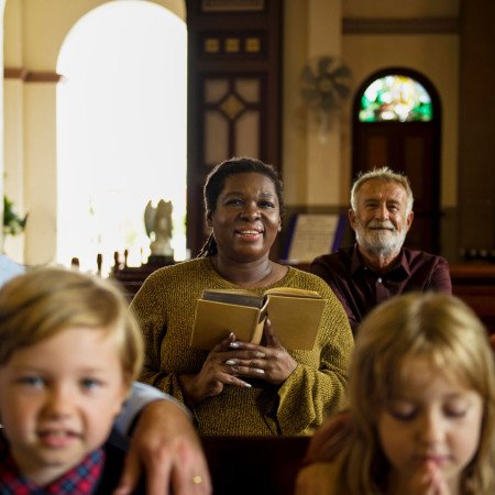 Lady in church congregation