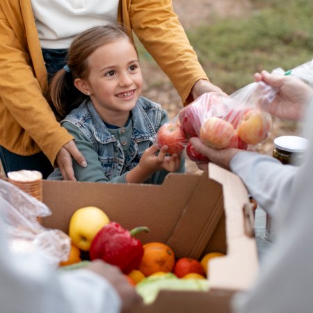 Child at community stall
