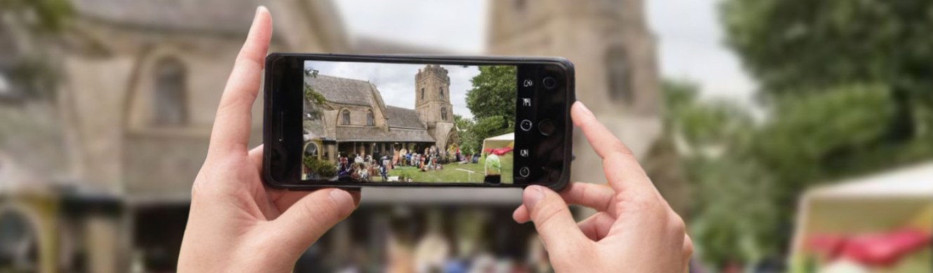photo of someone taking a photo of a church