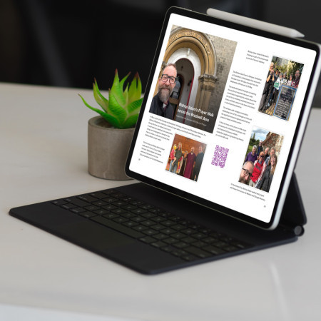 Person reading WePray on a iPad