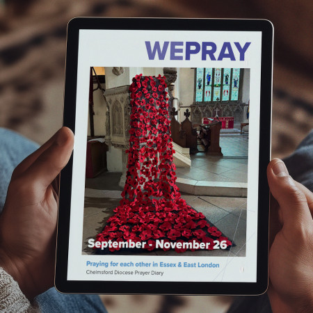 Person reading WePray on a iPad