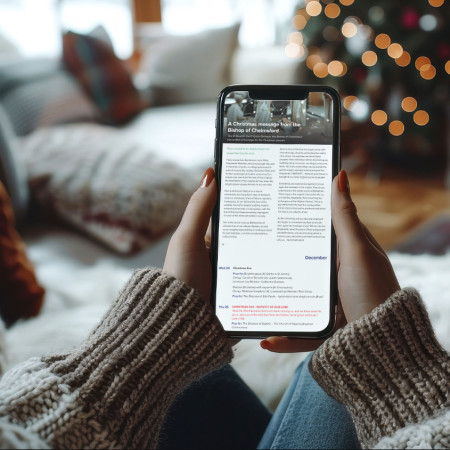 Person reading WePray on their phone