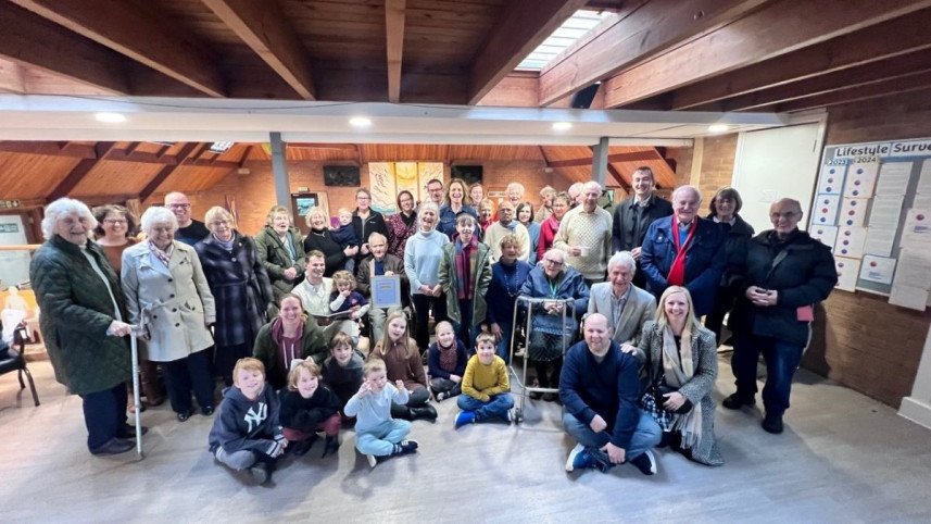 Worshippers at Christ Church, celebrate their Gold Eco Church award with Colchester MP Pam Cox 