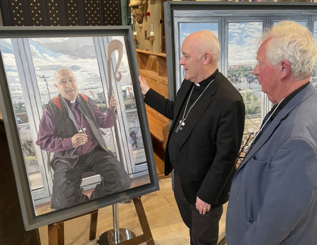 Archbishop Stephen looking at the painting