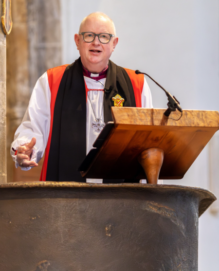 Bishop Roger giving service